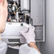 A man checking the gas in Gas Safety in Your London Property blog.