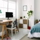 In front of the window is a table and chair with a computer set, a cabinet, and a bed in the Key Terms for Flatshare Agreement blog.