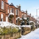 Apartment with snow on the street in Winter Property Maintenance blog.