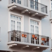 An apartment block with balconies on the Landlord rent guarantee blog.