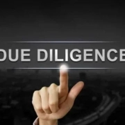 A finger pointing to the due diligence in the guaranteed rental income blog.