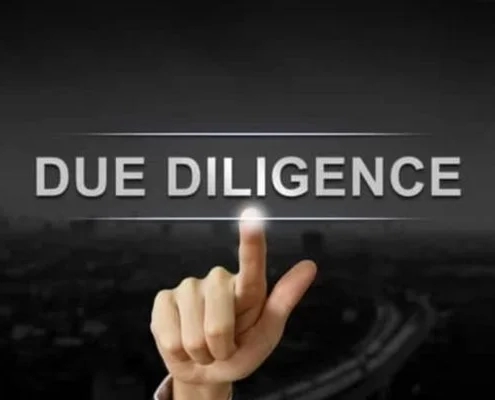 A finger pointing to the due diligence in the guaranteed rental income blog.